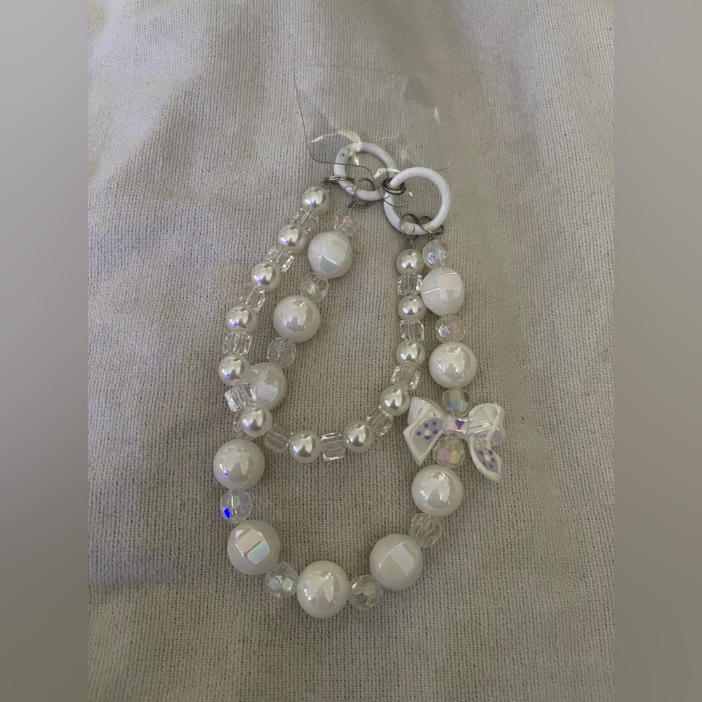 Elegant White Beaded Phone Wristlet